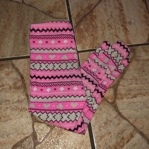 Girls leggings, sweatpants, and shirts.